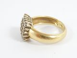 an image of a gold ring with diamonds on a white background