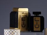 three different types of perfumes sitting on a table