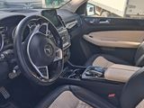 a picture of the interior of a car that is parked in a lot