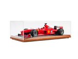 a red ferrari racing car in a clear display case