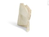 marble sculpture of a hand holding a paper bag on a white surface