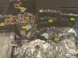 a lot of stamps on a table with a lot of stickers on it