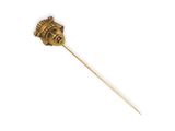 an image of a gold stick with a flower on it