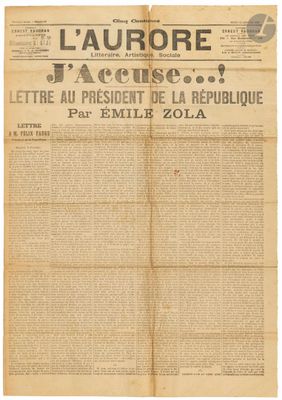 the front page of a newspaper with a large piece of paper on it
