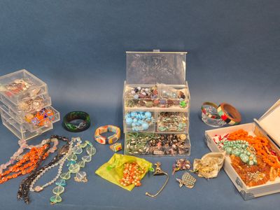 many different types of jewelry in a box