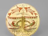 an image of a decorative plate with a bird and fish design