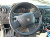 dashboard view of a car with a steering wheel and dashboard controls