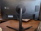 an image of a desk with a computer monitor and a telephone