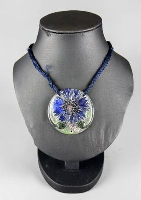 necklace with a blue flower on a blue string