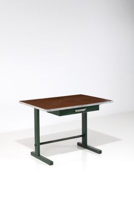 an image of a desk with a wooden top and metal legs