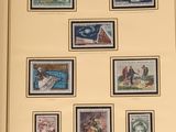 framed picture of a collection of stamps with a picture of a man and a woman