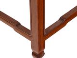 an image of a close up of a wooden table with a glass top