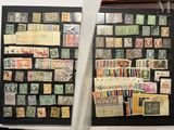 many different types of stamps on display in a display case
