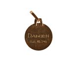 a close up of a dog tag on a white background