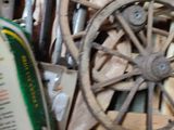 a wheel that is sitting on top of a pile of books