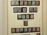 an open book with a picture of stamps on it