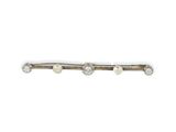 a close up of a hair pin with pearls on it