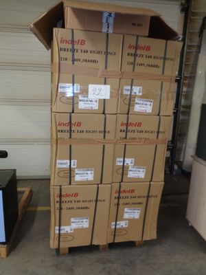 many boxes stacked on top of each other in a garage