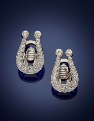 a pair of sapphire and diamond earrings