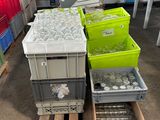boxes and crates are stacked on pallets in a warehouse
