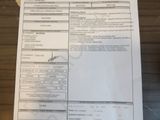 a picture of a paper with a picture of a person ' s name on it