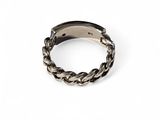 a close up of a ring on a white background