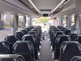 many empty seats on a bus that is parked