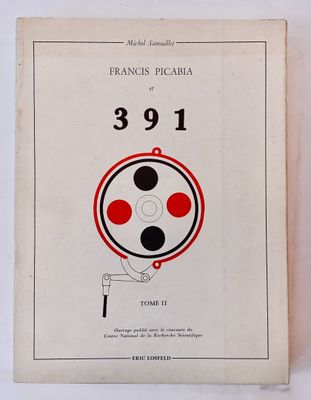 a white book with a red and black design on it