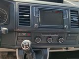a dashboard of a car with a steering control