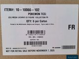 a box of pokemon tcg items on the table