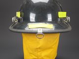 an image of a fireman ' s hard hat on a stand