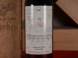 a bottle of wine that is sitting on a table