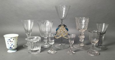 a lot of wine glasses that are sitting on a table