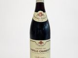 a bottle of wine that is sitting on a table