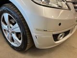 a close up of a car that is parked in a garage