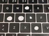 a close up of a computer keyboard with a lot of buttons on it