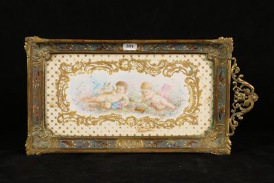 an antique picture frame with a painting of two cherensils