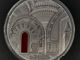 l'image d'une pièce d'argent sur laquelle figure une porte rouge