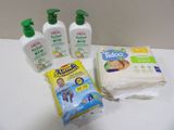 three bottles of soap, a bag of diapers, and a bag of wipes