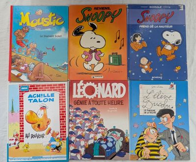 plusieurs livres pour enfants sont alignés sur une surface blanche