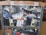 a metal cart with many items in it in a warehouse