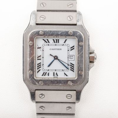 an image of a silver watch with roman numerals on the face