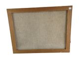 an image of a picture frame with a picture hanging on the wall
