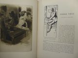 an open book with a picture of a woman sitting at a table