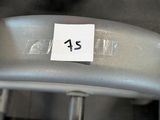 a close up of a metal object with a sticker on it