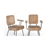 two chairs with wooden seats and metal legs on a white background