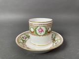 an image of a cup and saucer sitting on top of a table