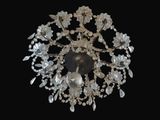 a crystal chandelier hanging from the ceiling