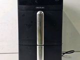 an image of a black and silver refrigerator with a silver handle
