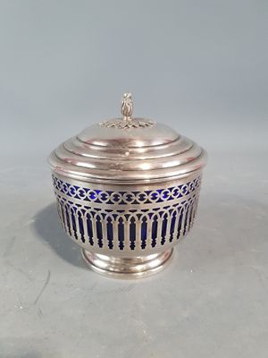 an antique silver and blue glass covered bowl with a lid
